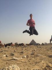 Happy Kevin jumping over a pyramid